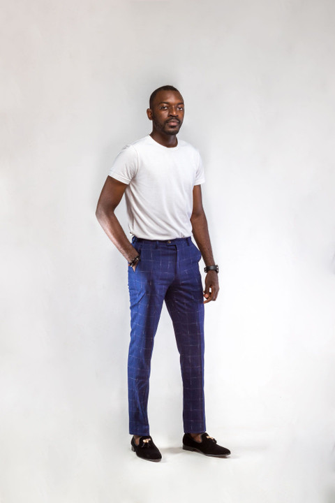 Blue checked tailored trousers with a white tee.