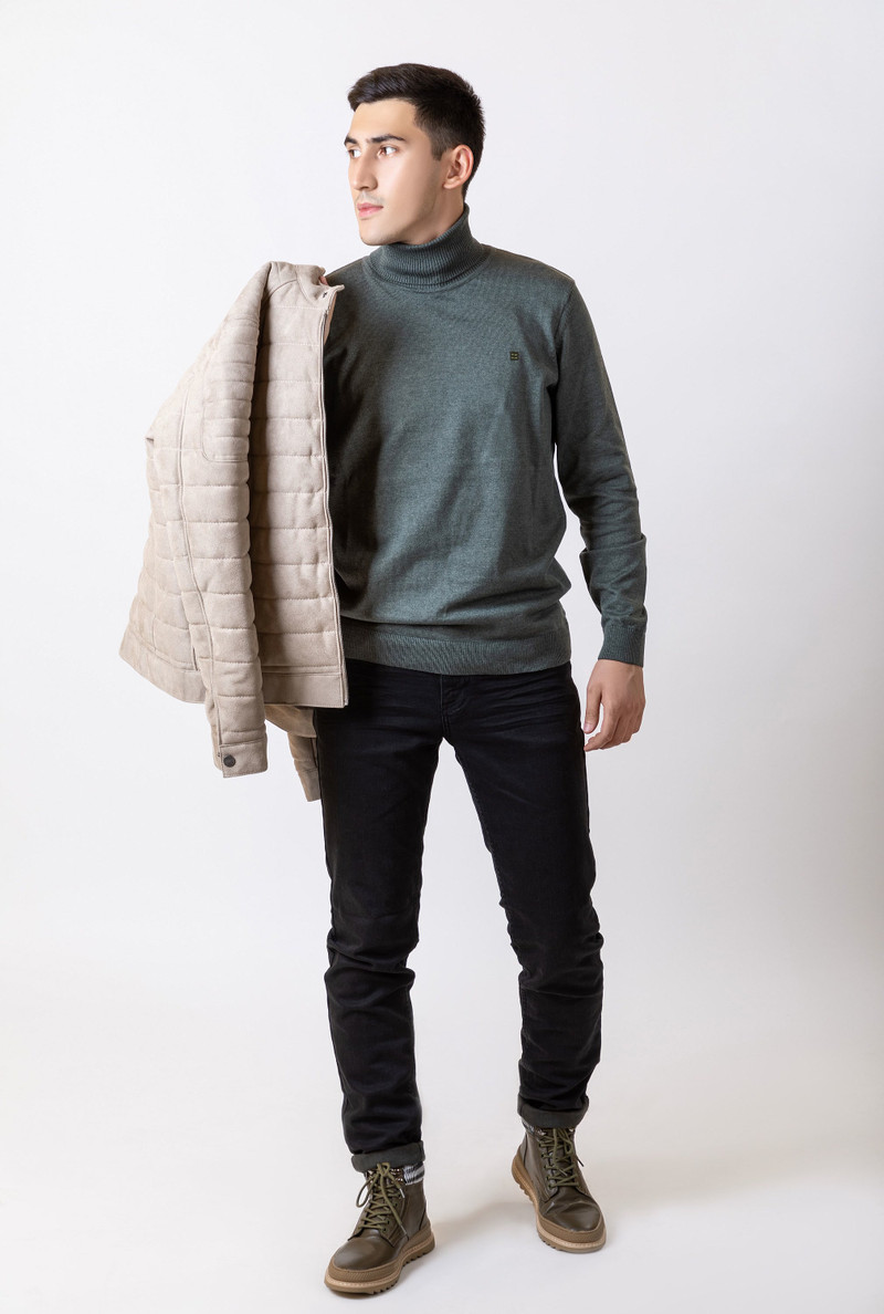The quilted jacket over the shoulder.