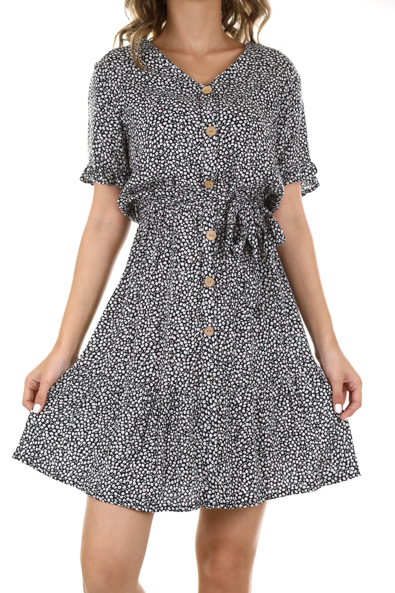 A button-front tea dress in a small print, on white.